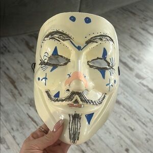 Cream and Blue Superhero Mask with Dramatic Features